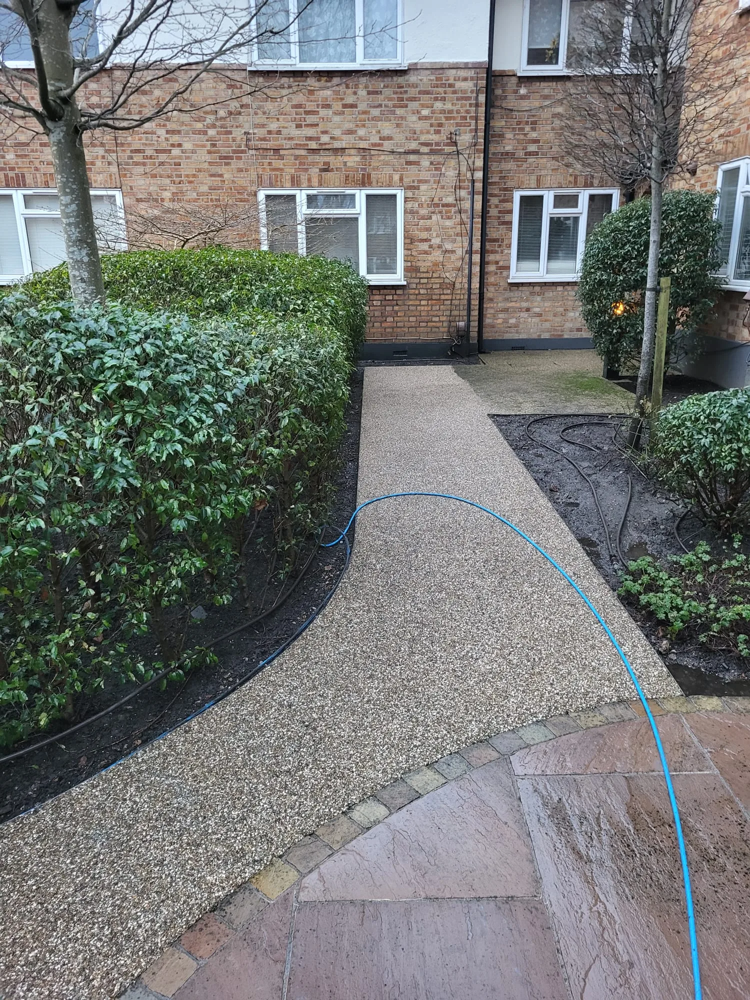 Block-paved driveway restored by pressure washing